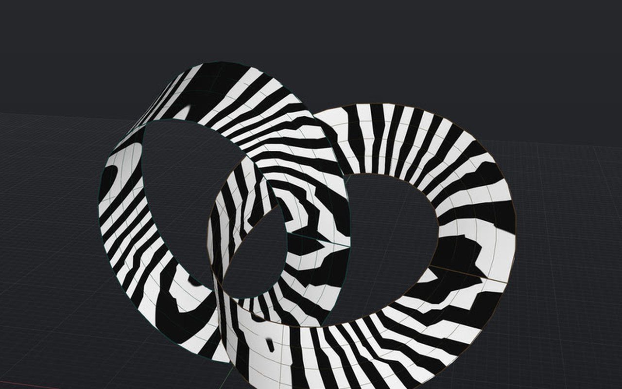 Zebra stripes on the Möbius bands: unbroken stripes mean the surface is smooth across every join.